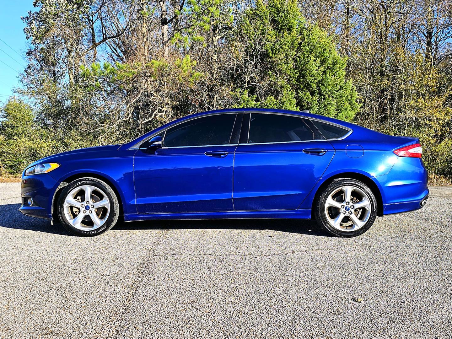 2015 Blue Ford Fusion SE (3FA6P0T96FR) with an 2.0L L4 DOHC 16V engine, Automatic transmission, located at 18001 Kellogg Rd, Saucier, MS, 39574, (228) 832-1441, 39.421459, -76.641457 - Photo#21